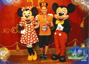 Kelly Akers, PT with Mickey and Minnie after the Walt Disney Marathon